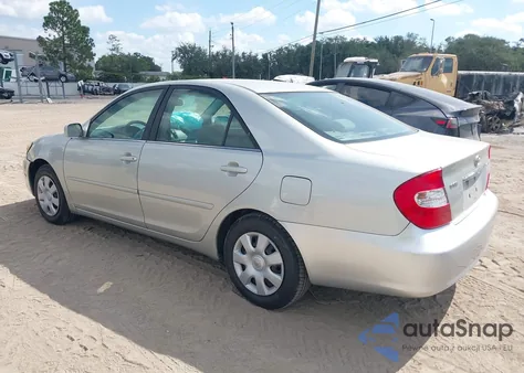 2002 Toyota Camry Le z USA, uszkodzony, nr VIN 4T1BE32K92U029451